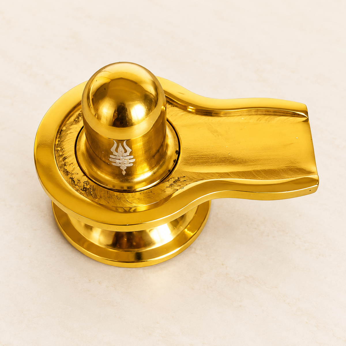 Gold-tone Shivling — overhead view